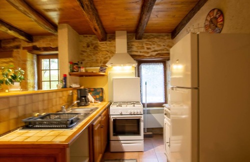 Marcillac-Saint-Quentin Cottage | Rustic stone house with garden and fireplace near Sarlat