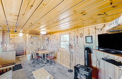 Lake Township House | Rustic getaway on Crystal Lake w/firepit, guest house & private dock