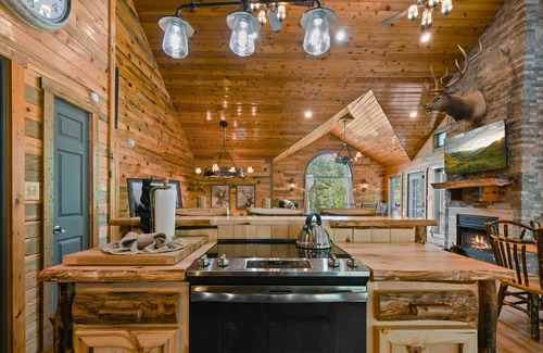 Sevierville Cabin | Rustic Hideaway 4 Bedroom Cabin by RedAwning