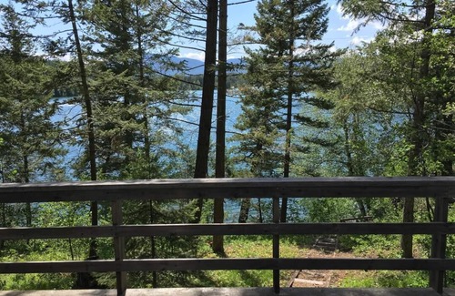 West Glacier Cabin | Rustic Lakeside Cabin- 3 miles from Glacier Park- get own beach & dock!