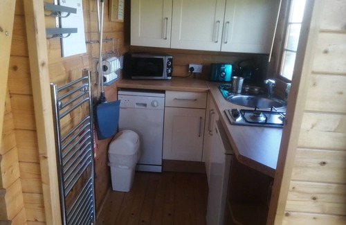 Harmer Hill Cottage | Rustic Log Cabin - Dog Friendly - Sleeps 2 - Views