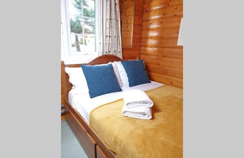 Bronaber House | Rustic Log cabin in Snowdonia By Seren Short Stays
