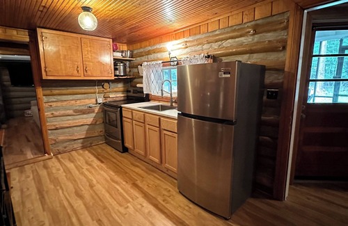 Mentone Cabin | Rustic log cabin on the river!
