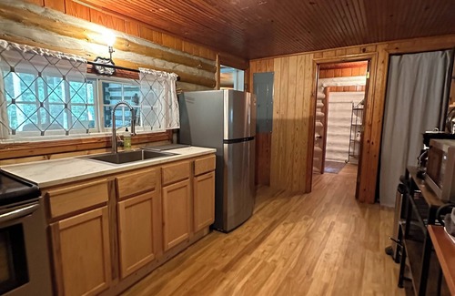 Mentone Cabin | Rustic log cabin on the river!