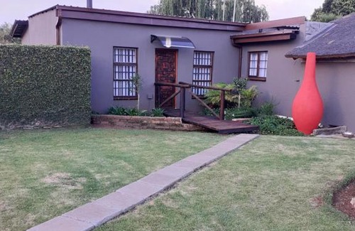Benoni House | Rustic red
