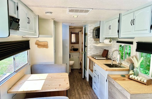 Fairview House | Rustic Remodeled Camper on Mini Farm with Farm Fresh Eggs