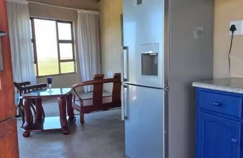 Lusikisiki Cottage | Rustic Retreat In A Peaceful Village. Overlooking The River And Ocean.
