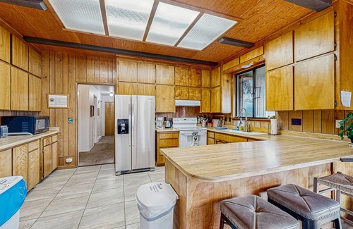 Graeagle House | Rustic riverfront house with wood stove & valley views from private deck