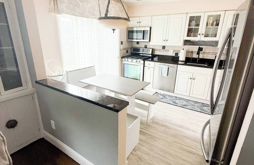 North Bellmore House | Ryder Cup Accommodation <8 miles Bethpage Black. heated salt water pool
