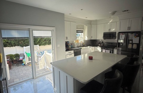 Seaford House | Ryder’s Cup Special! Spacious 4-bedrooms in charming Seaford with fitness & pool