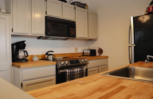 Rangeley Condo | Saddleback - Rock Pond Condo 43 - ski in/out, pet friendly!