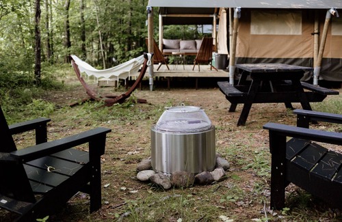 North Woodstock RV Rental | Safari Tent Site 8 | 1 Queen Bed & 2 Bunk Beds | Pond View