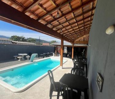 Melvi House | Salão para festas com piscina, bairro Jardim Melvi em Praia Grande - Salve Jorge