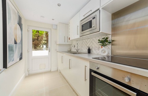 Port St Mary House | Salt Wood, a premium holiday home on the harbour in Port St Mary, perfect for groups.