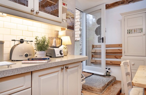 South Tawton Cottage | Sampsons boasts a plethora of characterful features, including a wood burning stove, exposed wood