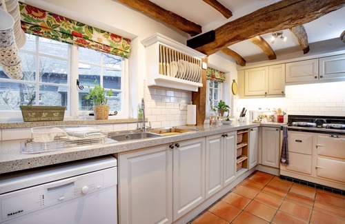 South Tawton Cottage | Sampsons boasts a plethora of characterful features, including a wood burning stove, exposed wood