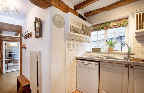 South Tawton Cottage | Sampsons boasts a plethora of characterful features, including a wood burning stove, exposed wood