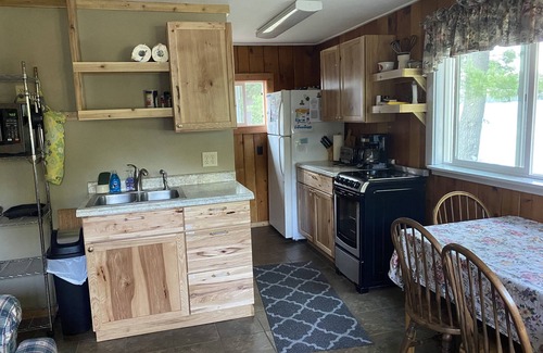 Sarona Cabin | Sam’s Place Cabin 1 on Long Lake, near shoreline, quiet. Own dock available.