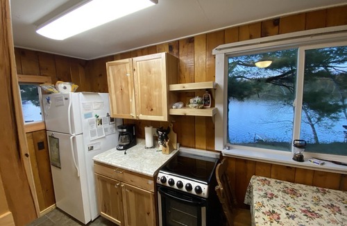 Sarona Cabin | Sam’s Place Cabin 1 on Long Lake, near shoreline, quiet. Own dock available.