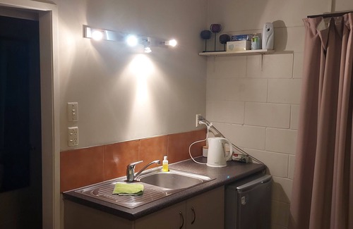 Tauranga Apartment | Sanctuary in your 2 bedroom unit. Safe parking directly outside. Pool & cabana.