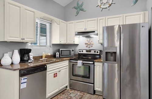 West Panama City Beach Condo | Sand Castles West A4: Steps to Beach, Pools, Private Balcony & More!