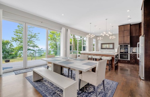 Riverside Villa | Sandy Shores: Stunning Modern Beach House with Sunset views over Lake Michigan