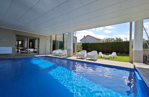 Sanxenxo House | Sanxenxo Casa Rial 47 con PISCINA CLIMATIZADA
