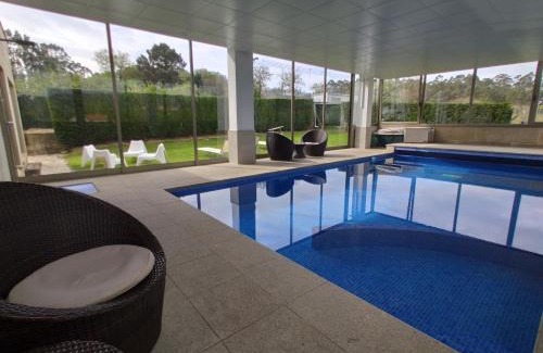 Sanxenxo House | Sanxenxo Casa Rial 47 con PISCINA CLIMATIZADA