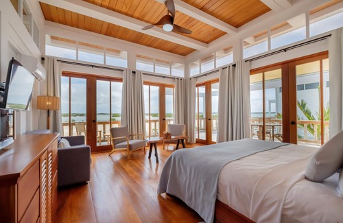 San Pedro Hotel | Scenic Beachfront Villa with Swimming Pool for Snorkeling Enthusiasts!