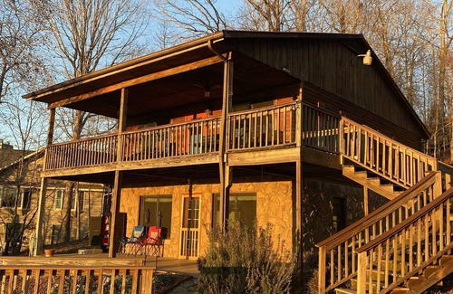 Ten Mile House | Scenic lake house with private covered dual-slip and two covered lake-view decks