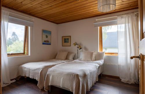 Huddinge Municipality House | Scenic Lakehouse near Stockholm with Sauna & Jetty