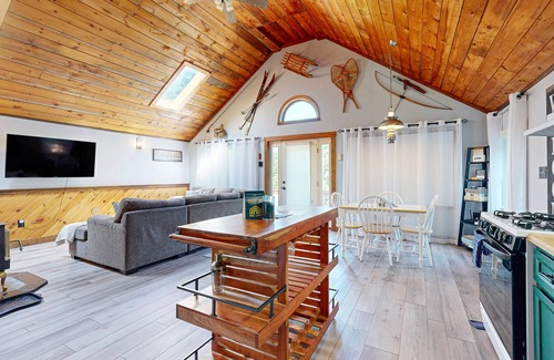 Greenville House | Scenic retreat with a spacious deck, gas fireplace, and Moosehead Lake views