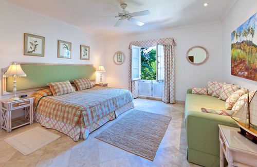 Schooner Bay Apartment | Schooner bay is a beachfront condominium with a freeform swimming pool as the focal point