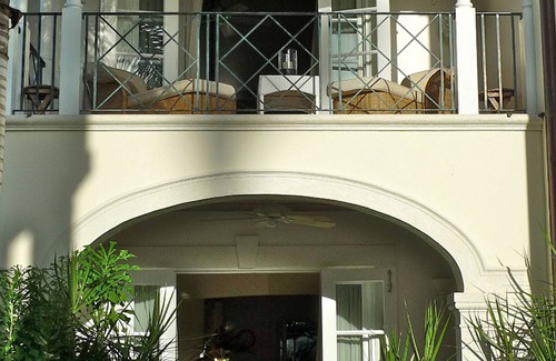 Schooner Bay Apartment | Schooner bay is a beachfront condominium with a freeform swimming pool as the focal point