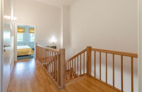 Muritz Apartment | Schwan - Ferienwohnung am Loppiner See mit Terrasse und Sauna