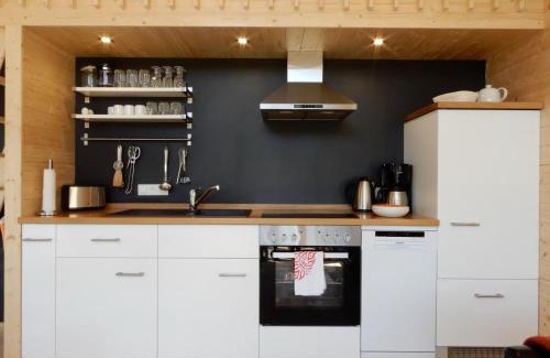 Zierow House | Schwarzes Holzferienhaus mit Sauna in Zierow - SONNENECK - 500m zum Ostsee-Strand, 4 - 6 Personen
