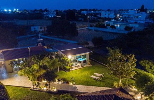 Petaloudes House | Sea Breeze & Nature villa ,near the sea, luxury jagguzi and spa private garden