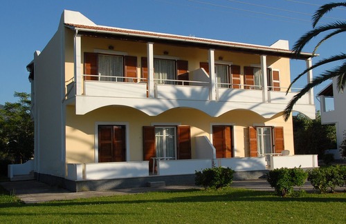 Acharavi Apartment | Seafront family Apartments within huge lawn grounds close to the resort center!