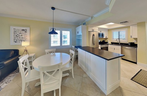Mid Island Condo | Seaside 210 | Renovated Beachfront Corner Condo w/Gulf Views + Pool Access