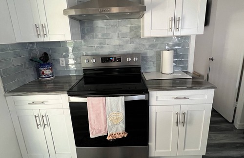 Placida Cottage | Secluded Beach House, steps to Sandy Beach on LGI with a shared dock!🏖️🎣