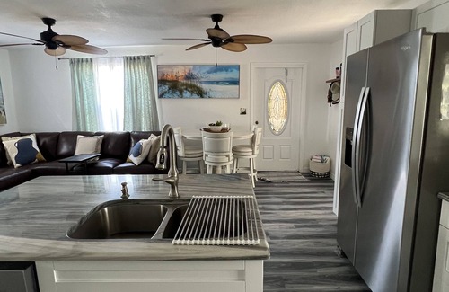 Placida Cottage | Secluded Beach House, steps to Sandy Beach on LGI with a shared dock!🏖️🎣