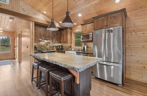 Whitefish Cabin | Secluded cabin with your own pond. Waterfront steps away. 30min to ski big mtn