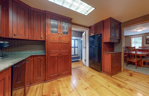 Mirror Lake House | Secluded, dog-friendly home with screened porch, firepit, fireplace & W/D
