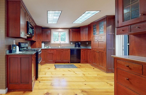Mirror Lake House | Secluded, dog-friendly home with screened porch, firepit, fireplace & W/D