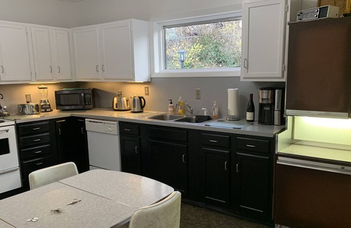 Crescent Hill House | Secluded Mid Century Home in Crescent Hill on a 1/2 acre in the city