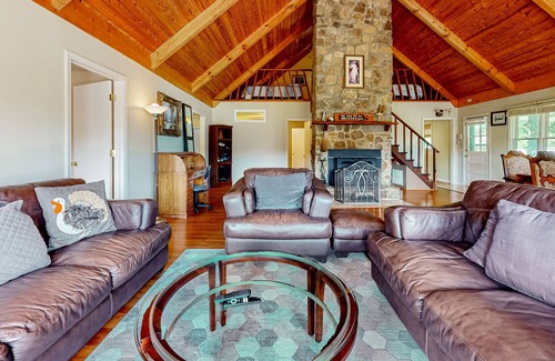 Cleveland House | Secluded mountain-view hideaway with pond, firepit, large yard, fireplace & AC