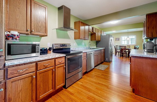Cleveland House | Secluded mountain-view hideaway with pond, firepit, large yard, fireplace & AC