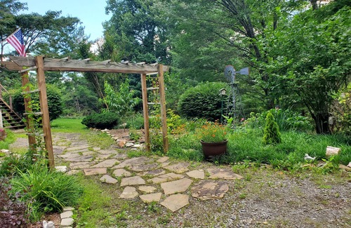 Waynesville Apartment | Secluded, peaceful property with waterfall feature and mountain views.
