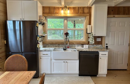 Fairhope Cabin | Secluded waterfront fishing cabin, boat dock, pier, sunsets, boat to beach