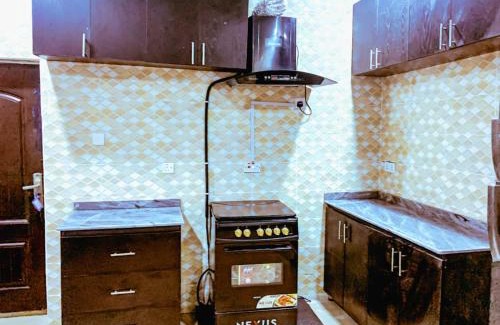 Abuja House | Select Winsome 1 Room, 1 King-sized Bed